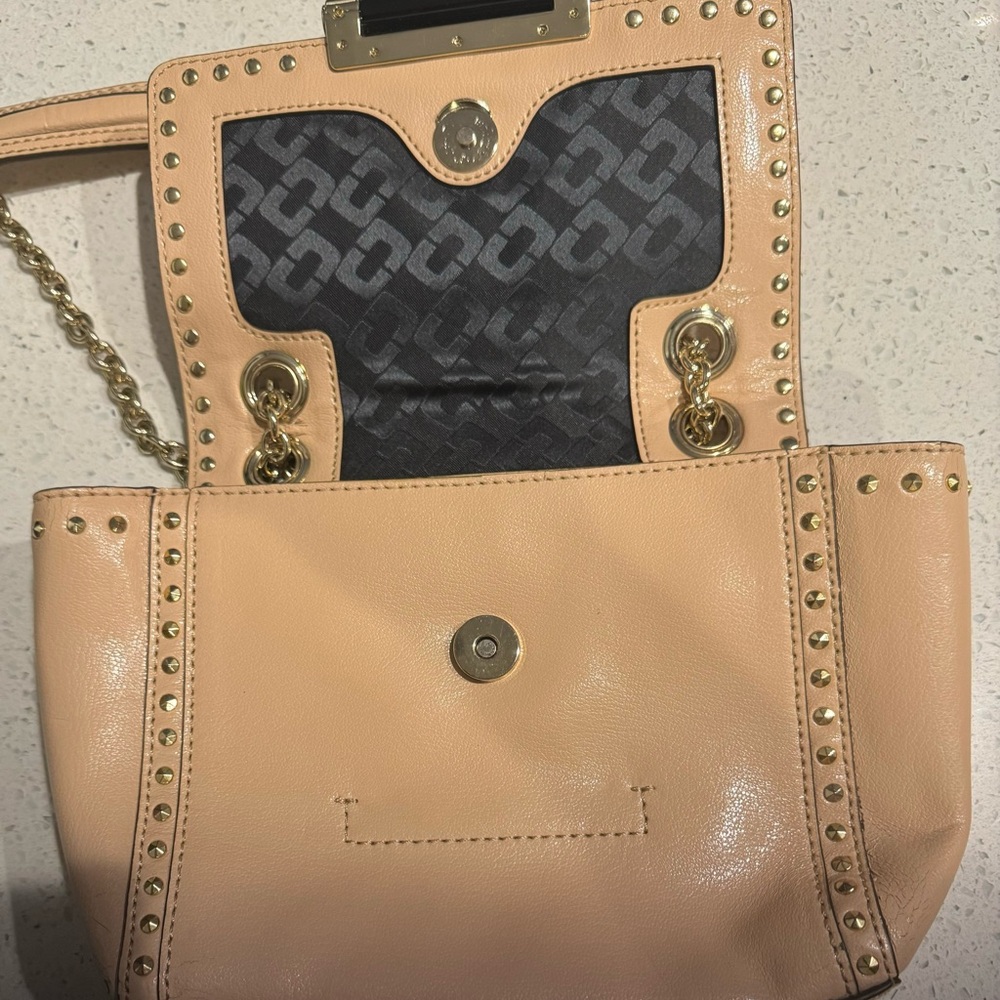 Multi Faceted Stud crossbody purse.